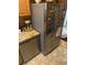 Modern kitchen features stainless steel refrigerator and dishwasher at 1910 E Palm Ave # 10303, Tampa, FL 33605