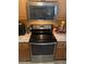 Stainless steel appliances and granite countertops highlight this modern kitchen at 1910 E Palm Ave # 10303, Tampa, FL 33605