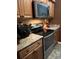 Modern kitchen with granite countertops and stainless steel appliances at 1910 E Palm Ave # 10303, Tampa, FL 33605