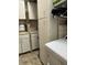 Laundry room featuring cabinets and shelving for storage at 1910 E Palm Ave # 10303, Tampa, FL 33605