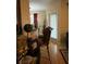 Living room with hardwood floors and access to a patio at 1910 E Palm Ave # 10303, Tampa, FL 33605