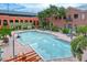 Large community pool with surrounding patio at 1910 E Palm Ave # 10303, Tampa, FL 33605