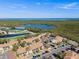 Aerial view showcasing condo community by the bay at 1945 Pelican Landing Blvd # 616, Clearwater, FL 33762