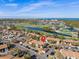 Aerial view showing condo location near golf course and bay at 1945 Pelican Landing Blvd # 616, Clearwater, FL 33762