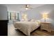 Bright bedroom with a king-size bed and built-in workspace at 1945 Pelican Landing Blvd # 616, Clearwater, FL 33762