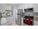 Kitchen with stainless steel appliances and granite counters at 1945 Pelican Landing Blvd # 616, Clearwater, FL 33762