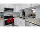 Kitchen with stainless steel appliances and granite counters at 1945 Pelican Landing Blvd # 616, Clearwater, FL 33762