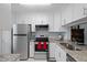 Kitchen with stainless steel appliances and granite counters at 1945 Pelican Landing Blvd # 616, Clearwater, FL 33762