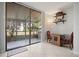 View of a screened patio with access from inside the home at 1945 Pelican Landing Blvd # 616, Clearwater, FL 33762