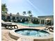 Refreshing community pool and spa with lounge chairs at 1945 Pelican Landing Blvd # 616, Clearwater, FL 33762