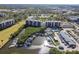Aerial view of Cove Cay showcasing condos, boat parking, a marina, and waterways at 2700 Cove Cay Dr # 2F, Clearwater, FL 33760