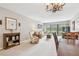Open-concept living room and dining area with sliding doors to the outdoors at 2700 Cove Cay Dr # 2F, Clearwater, FL 33760
