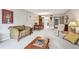 Open-concept living room with views into the dining area and kitchen at 2700 Cove Cay Dr # 2F, Clearwater, FL 33760