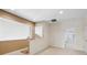 Upstairs hallway with carpet and doors leading to bedrooms at 3406 Heards Ferry Dr, Tampa, FL 33618