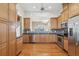 Spacious kitchen featuring stainless steel appliances and hardwood floors at 3406 Heards Ferry Dr, Tampa, FL 33618