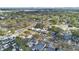 Aerial view of a residential neighborhood with trees and homes at 3921 55Th N Ave, St Petersburg, FL 33714