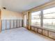 Unfinished dining room with exposed walls, awaiting renovation at 4235 Stratford Dr, New Port Richey, FL 34652