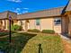 Condo exterior showcasing front entrance and landscaping at 4235 Stratford Dr, New Port Richey, FL 34652