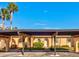 Condo exterior with carport and landscaping at 4235 Stratford Dr, New Port Richey, FL 34652