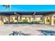 Carport with three parking spots and view of condo units at 4235 Stratford Dr, New Port Richey, FL 34652