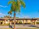 Condo exterior showcasing carport and landscaping at 4235 Stratford Dr, New Port Richey, FL 34652