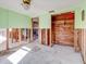 Renovation project: large room with exposed framing, plumbing, and wiring at 4235 Stratford Dr, New Port Richey, FL 34652