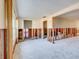 Large living area under renovation with exposed walls and framing at 4235 Stratford Dr, New Port Richey, FL 34652