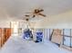 A living room undergoing renovations, showing exposed framing and flooring at 4235 Stratford Dr, New Port Richey, FL 34652