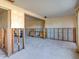 A stripped living room, showing studs, wires, and a concrete floor at 4235 Stratford Dr, New Port Richey, FL 34652