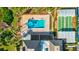 Community pool and shuffleboard courts at 4235 Stratford Dr, New Port Richey, FL 34652