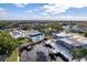 Wide aerial view of neighborhood with waterfront homes at 6004 Tampa Shores Blvd, Tampa, FL 33615