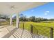 Spacious back porch overlooking fenced in yard at 6303 Barton Rd, Plant City, FL 33565