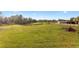 Large, grassy backyard and fenced pasture at 6303 Barton Rd, Plant City, FL 33565
