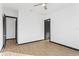 This bedroom is a clean slate with a ceiling fan, light wood floor, and black trim at 6303 Barton Rd, Plant City, FL 33565