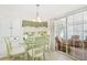 Bright breakfast nook with view of the backyard at 64 Pelican S Dr, Oldsmar, FL 34677