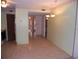 Bright dining area with access to kitchen and hallway at 6400 46Th N Ave # 105, Kenneth City, FL 33709