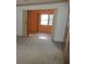 Open living area with access to another room at 6400 46Th N Ave # 105, Kenneth City, FL 33709