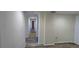 Long hallway with wood-look floors and access to rooms at 701 S Madison Ave # 416, Clearwater, FL 33756