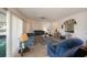 Living room with blue sofas, a coffee table, and a Christmas tree at 7507 Meadow Dr, Tampa, FL 33634