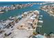 Aerial view of neighborhood and canal at 8021 Coquina Way, St Pete Beach, FL 33706