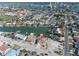 Aerial view of a home located in a waterfront community at 8021 Coquina Way, St Pete Beach, FL 33706