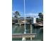 Modern boat lift and waterfront access at 8021 Coquina Way, St Pete Beach, FL 33706