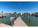 Wooden dock offering waterfront access at 8021 Coquina Way, St Pete Beach, FL 33706