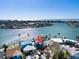 Aerial view showcasing home's location on waterfront property at 807 Bay Point Dr, Madeira Beach, FL 33708