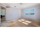Large bedroom with water views and plenty of natural light at 807 Bay Point Dr, Madeira Beach, FL 33708