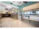 Large kitchen with stainless steel appliances and outdoor access at 807 Bay Point Dr, Madeira Beach, FL 33708