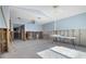 Spacious living room with high ceilings and natural light at 807 Bay Point Dr, Madeira Beach, FL 33708