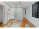 Bonus room with stained concrete floors, ceiling fan, and laundry area at 9167 108Th St, Seminole, FL 33772
