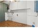 The laundry room offers practical functionality at 9167 108Th St, Seminole, FL 33772