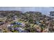 Aerial view of a coastal residential area with houses and trees at 930 Snell Isle Ne Blvd, St Petersburg, FL 33704